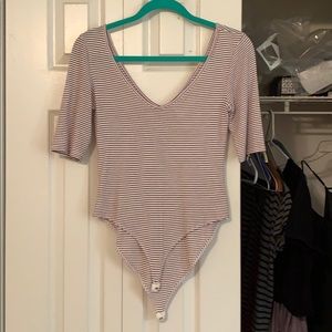 Edgy striped body suit